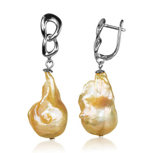 Mayfair Pearls golden baroque drop earrings with sculpted silver link design.