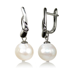 Sophisticated round pearl dangle earrings in silver setting from Mayfair Pearls