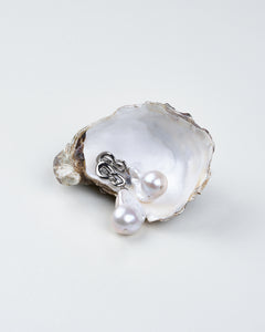 Luxury white pearl earrings with unique silver link setting from Mayfair Pearls